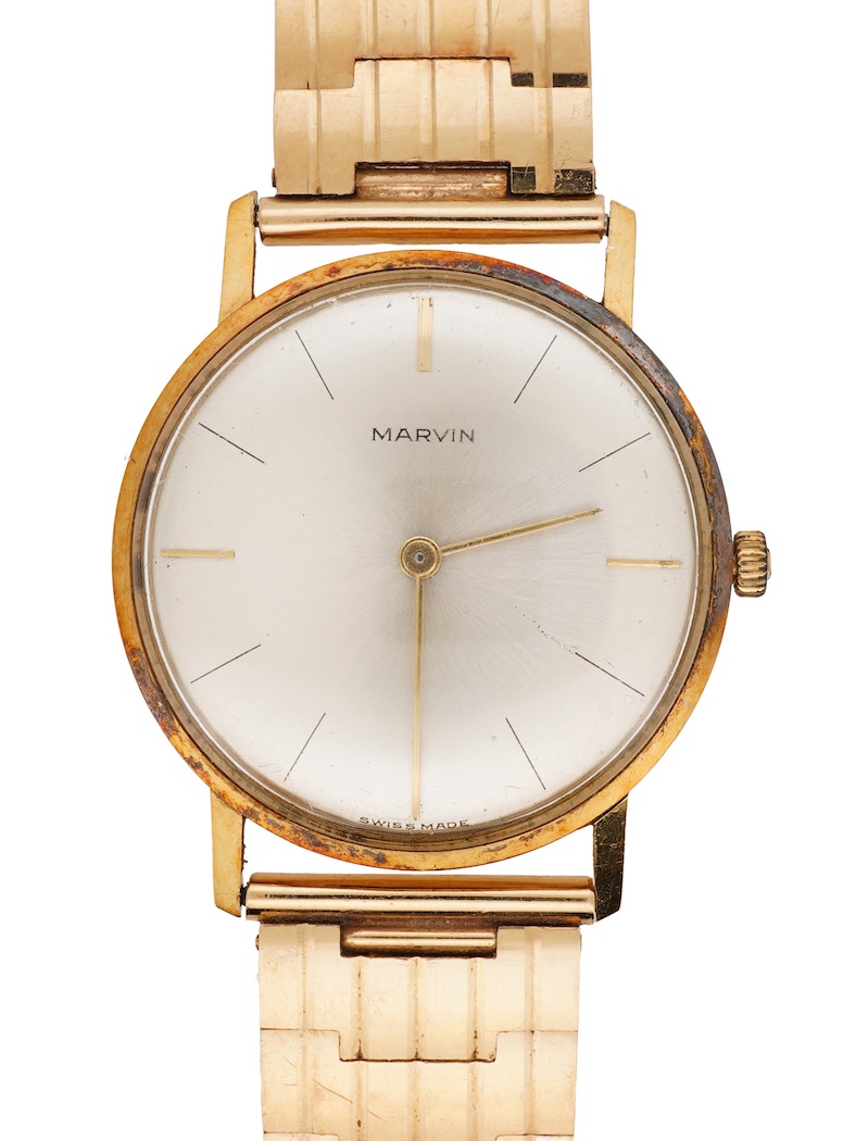 A gentleman's Swiss 18k gold Marvin manual wind dress wrist watch, with a Swiss 18k gold fancy brick link bracelet